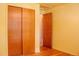 Bedroom with closet and doorway at 962 S Beech St, Lakewood, CO 80228