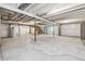 Unfinished basement with high ceilings and ample space at 8885 S Tibet Ct, Aurora, CO 80016