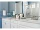 Double vanity bathroom with a walk-in shower at 8885 S Tibet Ct, Aurora, CO 80016