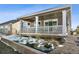 House exterior with covered porch and landscaping at 8885 S Tibet Ct, Aurora, CO 80016