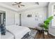 Main bedroom with a king bed and plenty of natural light at 8885 S Tibet Ct, Aurora, CO 80016