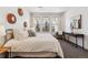 Comfortable bedroom with ample natural light, modern decor, and stylish furniture for a cozy retreat at 2851 W 52Nd Ave # 208, Denver, CO 80221