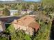 Aerial view features the backyard with a brick chimney and a pergola with patio furniture at 2250 S Zang Ct, Lakewood, CO 80228