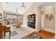 Bright dining area with sliding glass doors to the fenced patio and view of the landscaping at 8595 Gold Peak Dr # A, Highlands Ranch, CO 80130