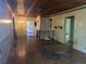 Spacious living room with hardwood floors, wood ceiling, and potential for customization at 1251 Lee St, Lakewood, CO 80215