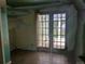 Interior room featuring glass doors at 1251 Lee St, Lakewood, CO 80215