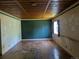 Room with wooden floors, a wood ceiling and natural light at 1251 Lee St, Lakewood, CO 80215