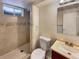 Bathroom with shower, toilet, and vanity with a large mirror at 3569 W 89Th Ave, Westminster, CO 80031