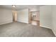 Open living room with neutral walls and carpet flooring at 3569 W 89Th Ave, Westminster, CO 80031