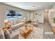 Virtually staged living room featuring neutral tones and ample natural light at 3569 W 89Th Ave, Westminster, CO 80031