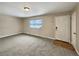 Living room with neutral walls, carpet, and entryway at 3569 W 89Th Ave, Westminster, CO 80031