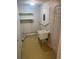 Laundry room with linoleum floors and utility sink at 2995 S Whiting Way, Denver, CO 80231