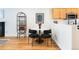 Chic dining area with a round marble table and open shelving at 1415 E 16Th Ave # 1/2, Denver, CO 80218