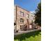 Stone exterior of a charming multi-unit building with well-maintained landscaping at 1415 E 16Th Ave # 1/2, Denver, CO 80218