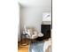 Relaxing living room with a comfortable armchair and fireplace at 1415 E 16Th Ave # 1/2, Denver, CO 80218
