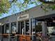 Exterior of Revere Brewing Company, featuring a large sign and outdoor seating at 1415 E 16Th Ave # 1/2, Denver, CO 80218