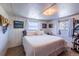 Cozy bedroom with a comfortable bed, soft lighting, and charming decor, creating a relaxing retreat at 6597 S State Highway 83, Franktown, CO 80116