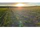 Scenic view of large field with barbed wire fence line during sunset at 6597 S State Highway 83, Franktown, CO 80116
