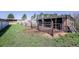 Horse shelter with metal gates and metal fencing on a sprawling, grassy property at 6597 S State Highway 83, Franktown, CO 80116