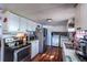 Efficient kitchen featuring modern appliances and white cabinetry, creating a functional and welcoming space at 6597 S State Highway 83, Franktown, CO 80116