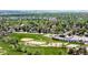 Aerial shot of a school complex nestled within a vibrant neighborhood and adjacent to expansive playing fields at 5674 S Ingalls St, Littleton, CO 80123