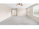 Spacious bedroom with ceiling fan and neutral decor at 5674 S Ingalls St, Littleton, CO 80123