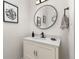 Stylish powder room featuring a modern vanity, oval mirror, and elegant decorative accents at 5489 Country Club Dr, Larkspur, CO 80118