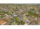 Panoramic aerial view of a serene neighborhood with lush greenery and cozy homes and tree lined streets at 6482 S Cedar St, Littleton, CO 80120