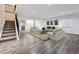 Spacious finished basement with neutral paint, modern floors, and ample lighting at 179 N Prairie Falcon Pkwy, Brighton, CO 80601