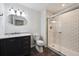 Stylish bathroom with a modern vanity, subway tile shower, and sleek glass door for a spa-like experience at 179 N Prairie Falcon Pkwy, Brighton, CO 80601