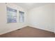 Bedroom with a window and neutral carpet, ready for your personal touch at 179 N Prairie Falcon Pkwy, Brighton, CO 80601
