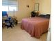 Bedroom with neutral decor, carpeted floors, and a comfortable bed at 3161 Madison Ave # R313, Boulder, CO 80303
