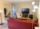 Cozy living room featuring neutral walls, carpet, and ample natural light at 3161 Madison Ave # R313, Boulder, CO 80303