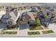 Aerial view of a single-Gathering home with solar panels, landscaping and an attached two-car garage at 18340 W 85Th Dr, Arvada, CO 80007