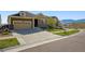 Charming two-story home with a spacious driveway and a neatly landscaped front yard at 18340 W 85Th Dr, Arvada, CO 80007