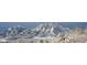 Snowy mountain range view with winter landscape at 2938 Kalmia Ave # 6, Boulder, CO 80301