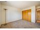 This bedroom offers neutral carpet and generous closet space at 2938 Kalmia Ave # 6, Boulder, CO 80301