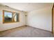 Bedroom with neutral carpeting and large window offering plenty of natural light at 2938 Kalmia Ave # 6, Boulder, CO 80301