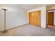 Bright bedroom with double-door closet and neutral walls at 2938 Kalmia Ave # 6, Boulder, CO 80301