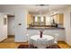 Bright dining area with a round table and four chairs at 2938 Kalmia Ave # 6, Boulder, CO 80301