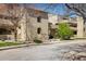 A charming multi-level home featuring neutral colors, a well-kept lawn, and mature trees in a serene neighborhood at 2938 Kalmia Ave # 6, Boulder, CO 80301