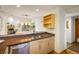 Bright kitchen area with stainless steel appliances and an adjacent view to the living room at 2938 Kalmia Ave # 6, Boulder, CO 80301