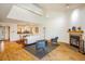 Bright and airy living space with a fireplace, vaulted ceiling, open layout, and easy access to the kitchen at 2938 Kalmia Ave # 6, Boulder, CO 80301