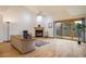 Spacious living room with hardwood floors, fireplace and access to deck at 2938 Kalmia Ave # 6, Boulder, CO 80301