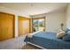 Spacious bedroom with balcony and closet, offering ample storage and natural light at 2938 Kalmia Ave # 6, Boulder, CO 80301