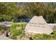 Community sign for Kalmia Court surrounded by lush landscaping at 2938 Kalmia Ave # 6, Boulder, CO 80301