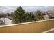 View from deck of parking lot and distant mountains at 2938 Kalmia Ave # 6, Boulder, CO 80301