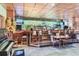 Inviting bar area with ample seating, a fully stocked bar, and a lively atmosphere at 14001 E Marina Dr # 211, Aurora, CO 80014
