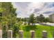 Scenic view of lush green landscape from condo grounds on a bright and sunny day at 14001 E Marina Dr # 211, Aurora, CO 80014