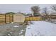 This backyard has a storage shed and is enclosed by a wood fence at 3532 N Vine St, Denver, CO 80205